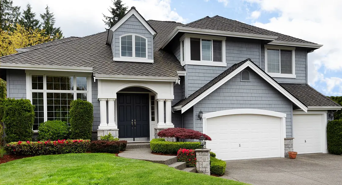 Home exterior with seamless gutters installed by Klasek Painting