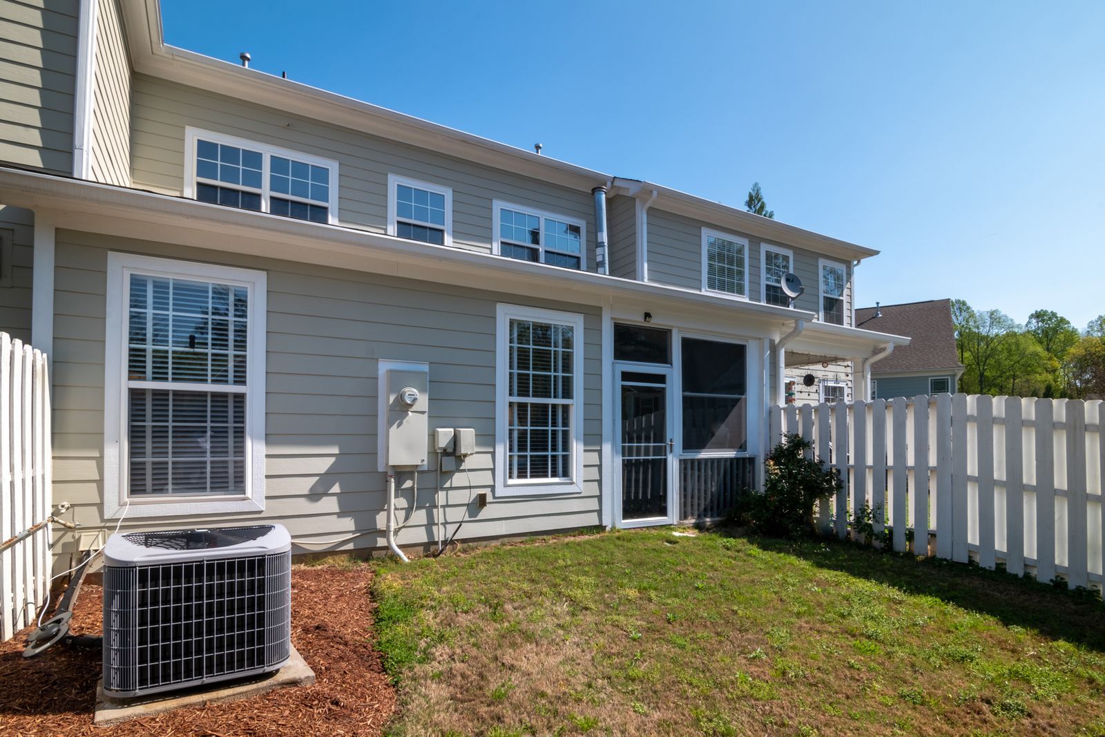 Gray fiber-cement lap siding on a modern home exterior