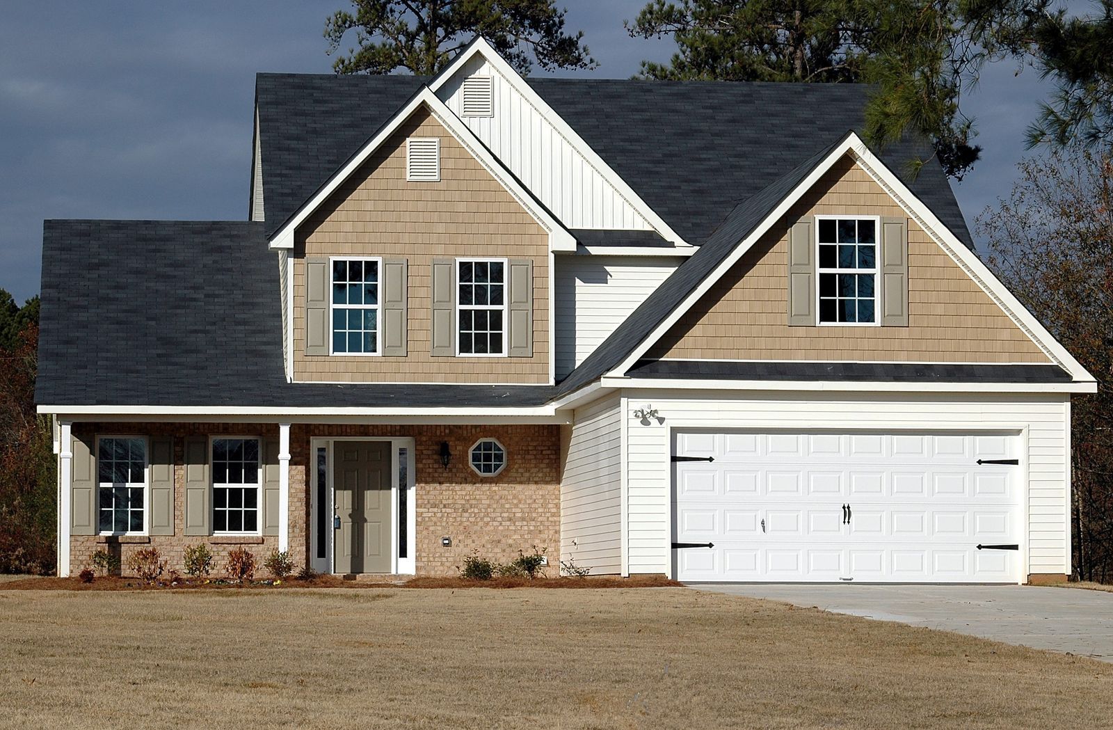 Suburban home with fiber-cement lap siding and board-and-batten gables